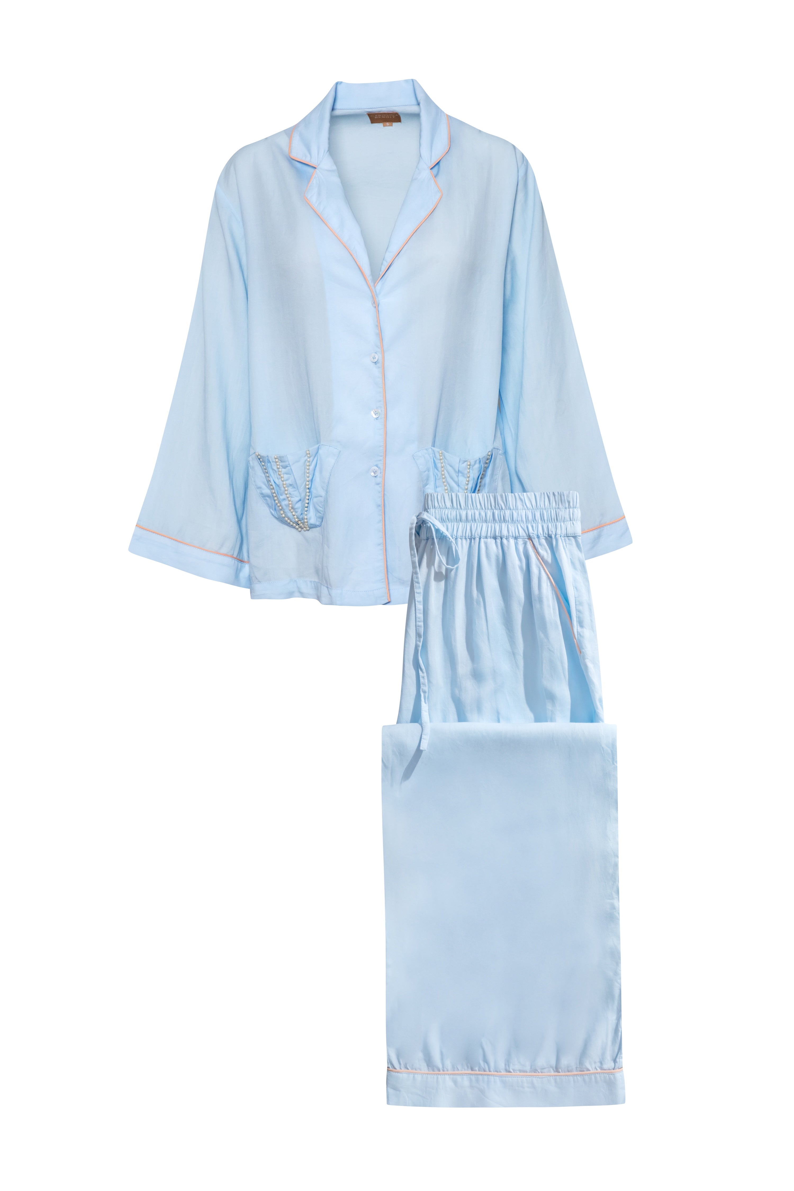 Light blue pajama set with shirt and pants on a white background with shell pocket