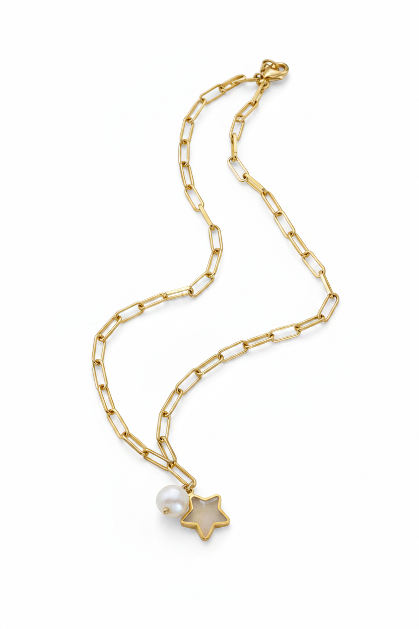 A gold paperclip chain necklace featuring a small gold star pendant with a white pearl accent, displayed on a clean white background.