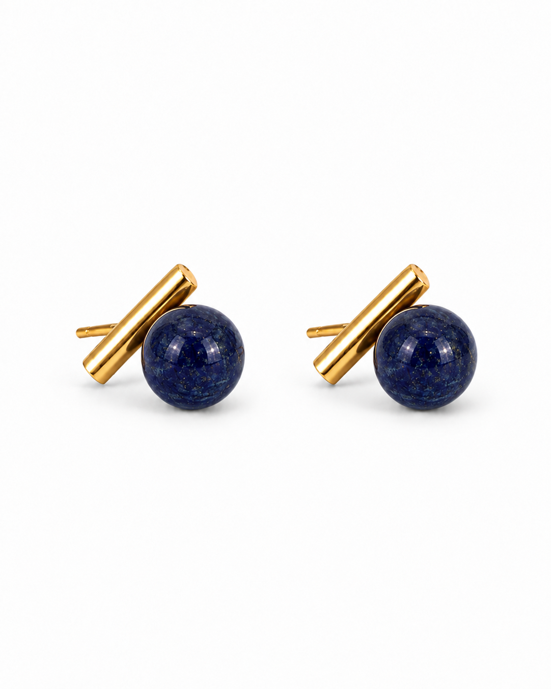 A pair of gold and lapis lazuli earrings on a clean white background. Each earring features a round, deep blue lapis lazuli stone with fine golden flecks, set next to a polished gold bar.