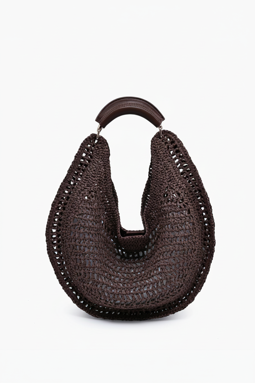 Brown woven handbag with a wooden handle on a white background