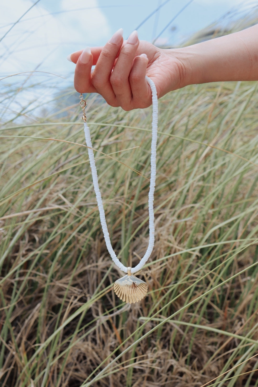 Golden Shell Necklace – Dainty Ocean Pendant