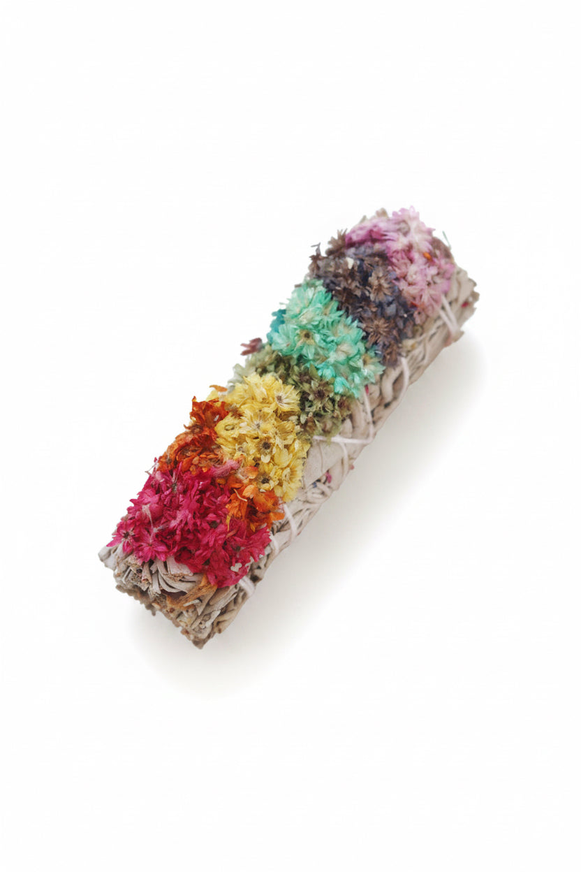 Colorful sage bundle with chakra colors flowers