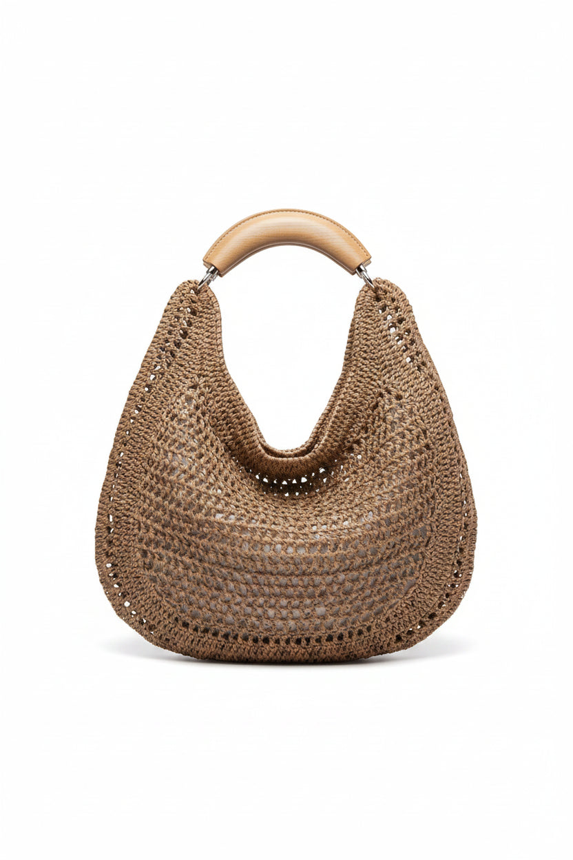 Brown woven handbag with a beige handle on a white background