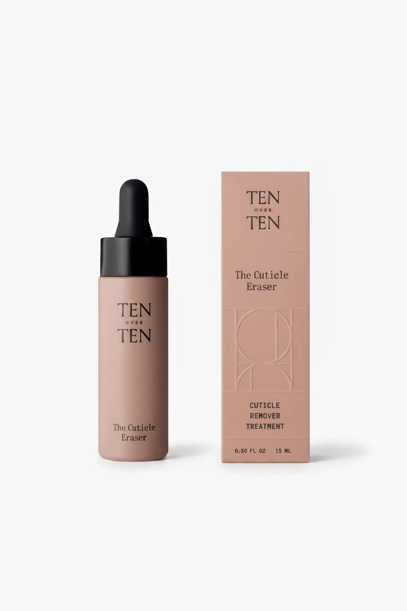 A bottle of 'Ten Over Ten - The Cuticle Eraser' with its packaging, indicating the product is a cuticle remover treatment.
