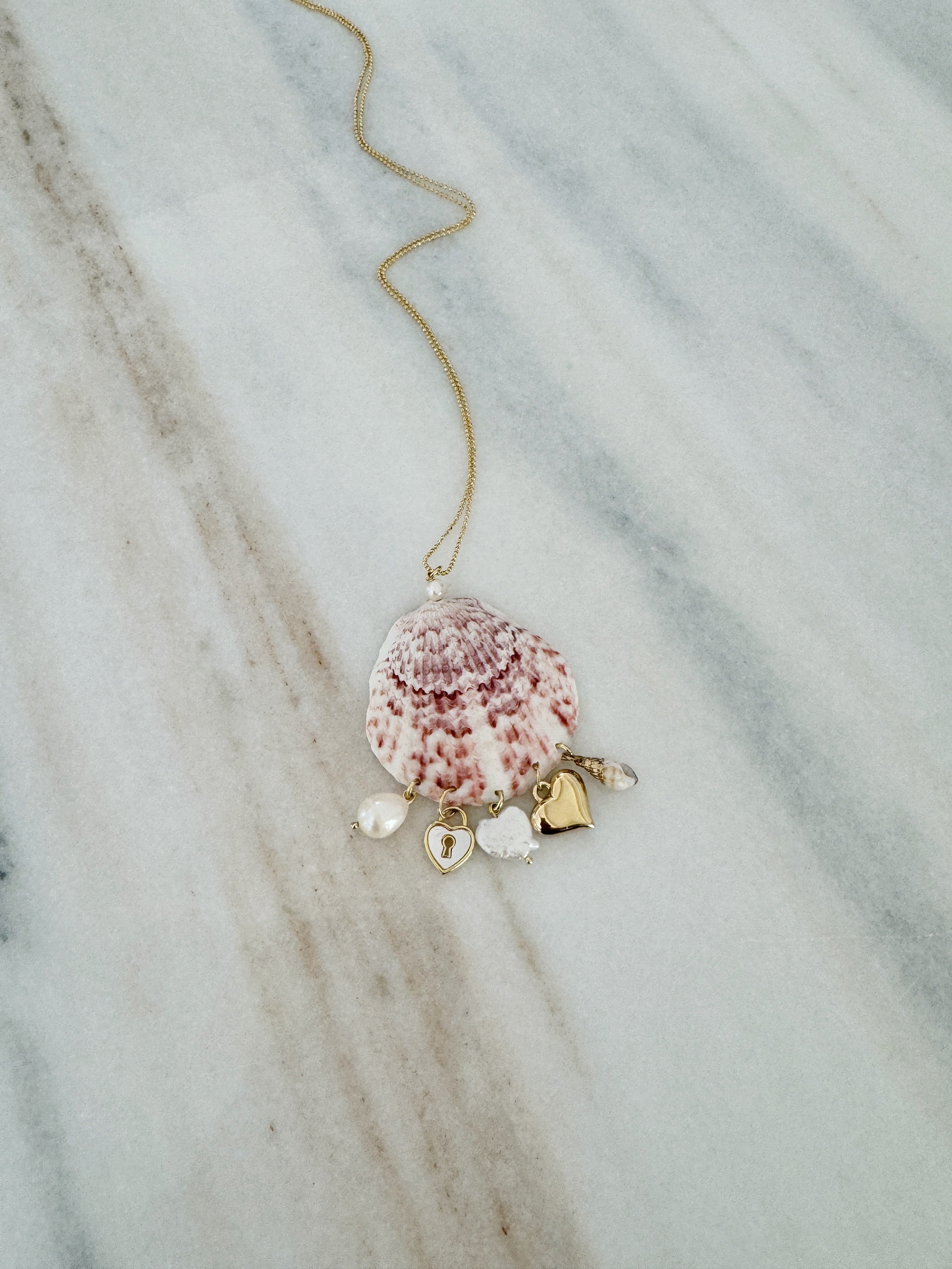 Shell necklace with gold charms