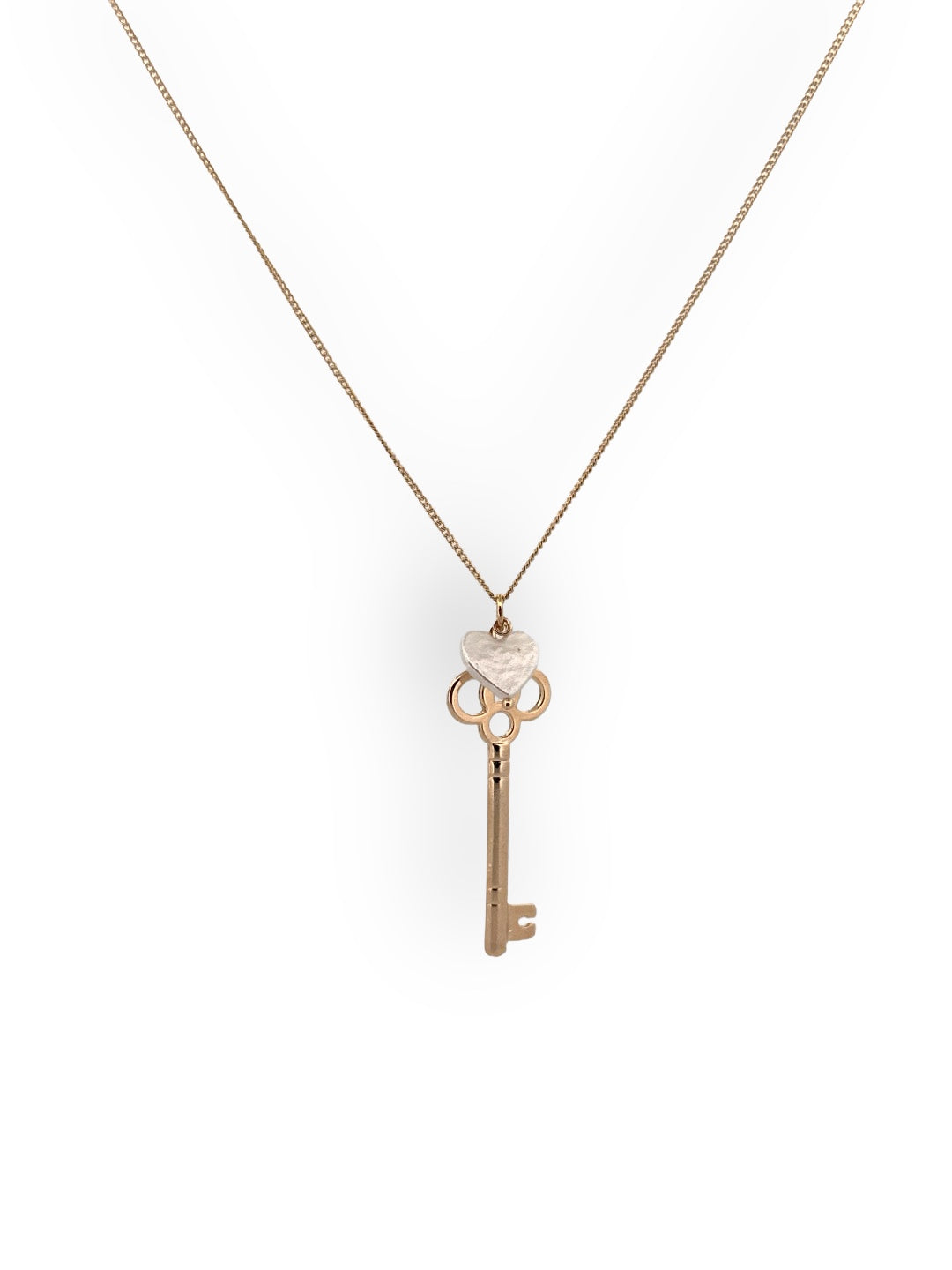 Gold key pendant necklace with heart-shaped freshwater pearl from the Lockheart Theory collection by Carolina Benoit, symbolic romantic jewelry gift for her.