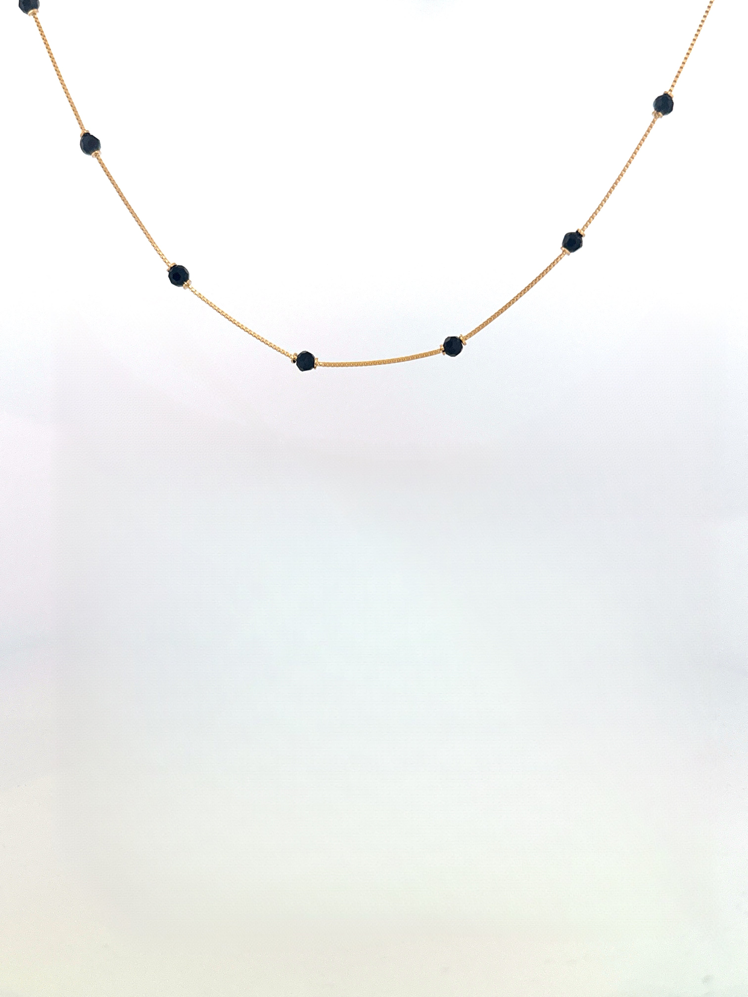 gold and black necklace swarovsky