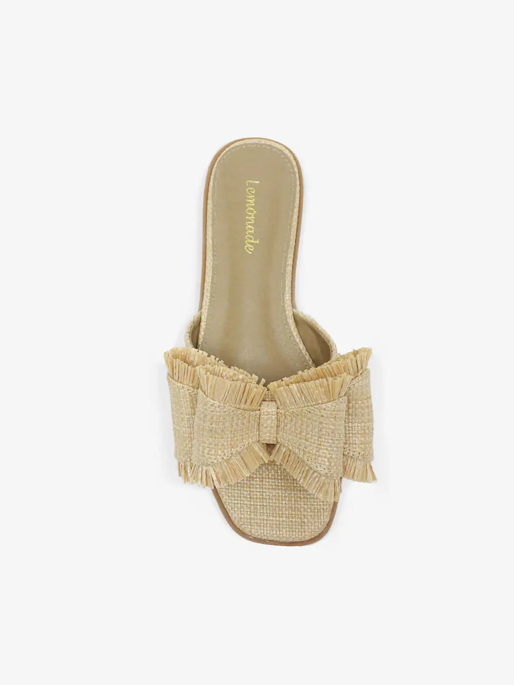 Beige sandal with raffia strap on a white background
