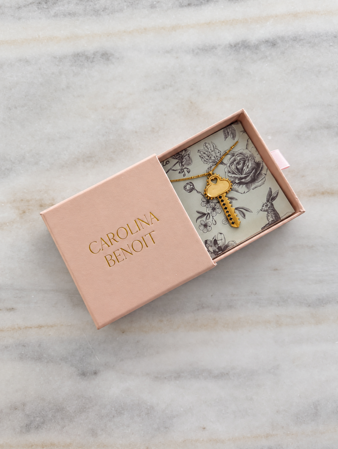 Carolina Benoit LoveKey necklace in blush jewelry box